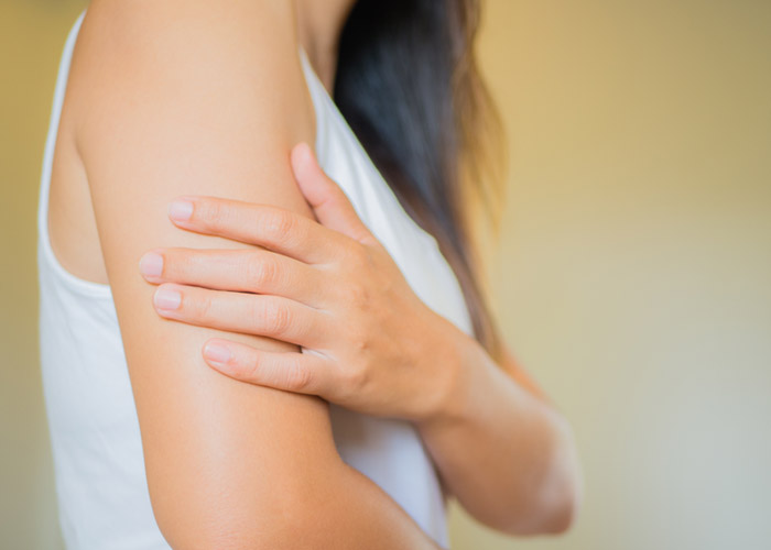 close up of womans arm
